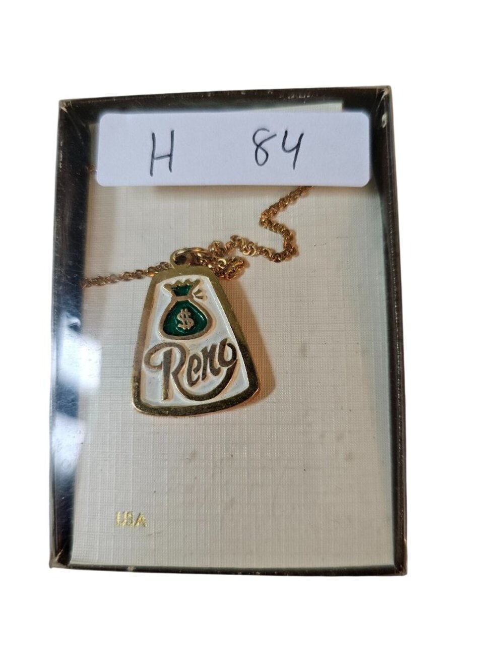 Gold-Tone Reno Pendant Necklace With Green & White Enamel Money Bag Design Made